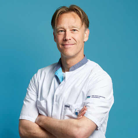 De heer dr. T.  Hillenaar